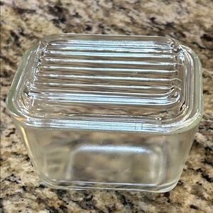 vintage Pyrex clear refrigerator dish, likely the 1.5-cup with ribbed lid